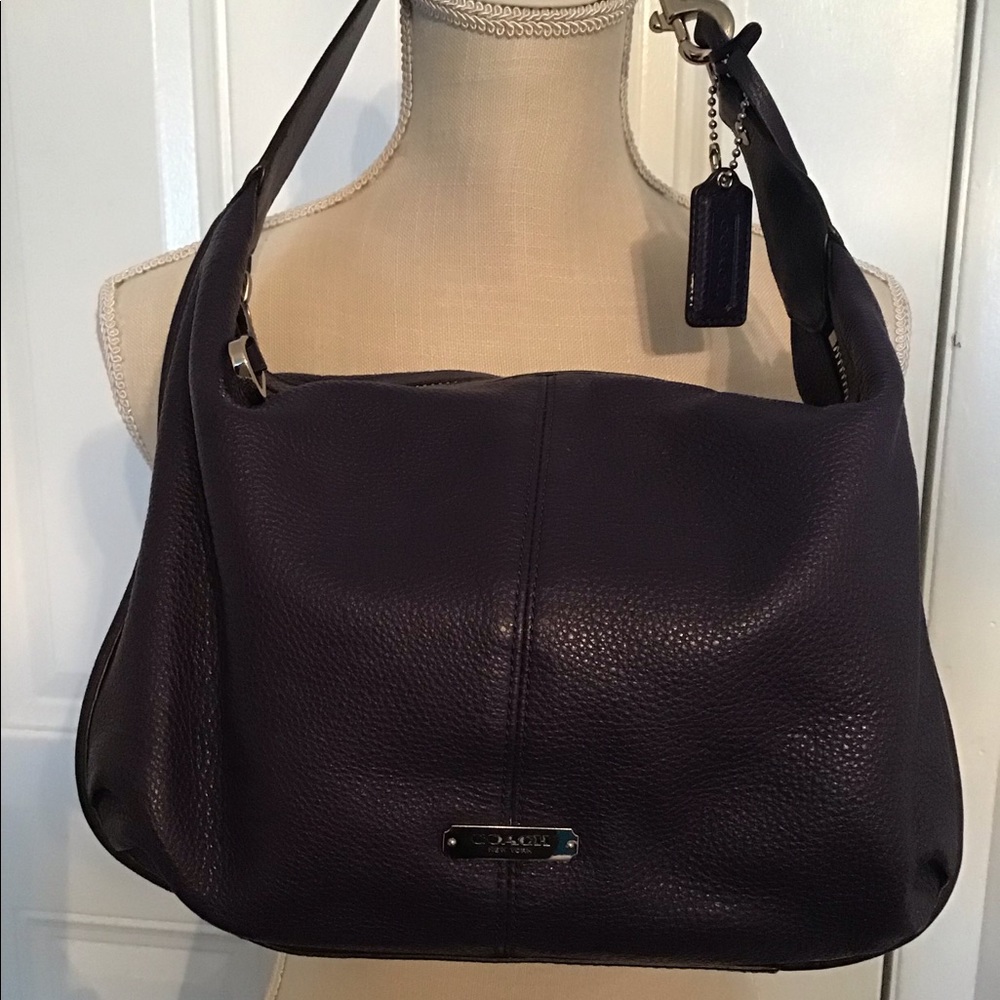 Like new Coach purse. Blue  in color